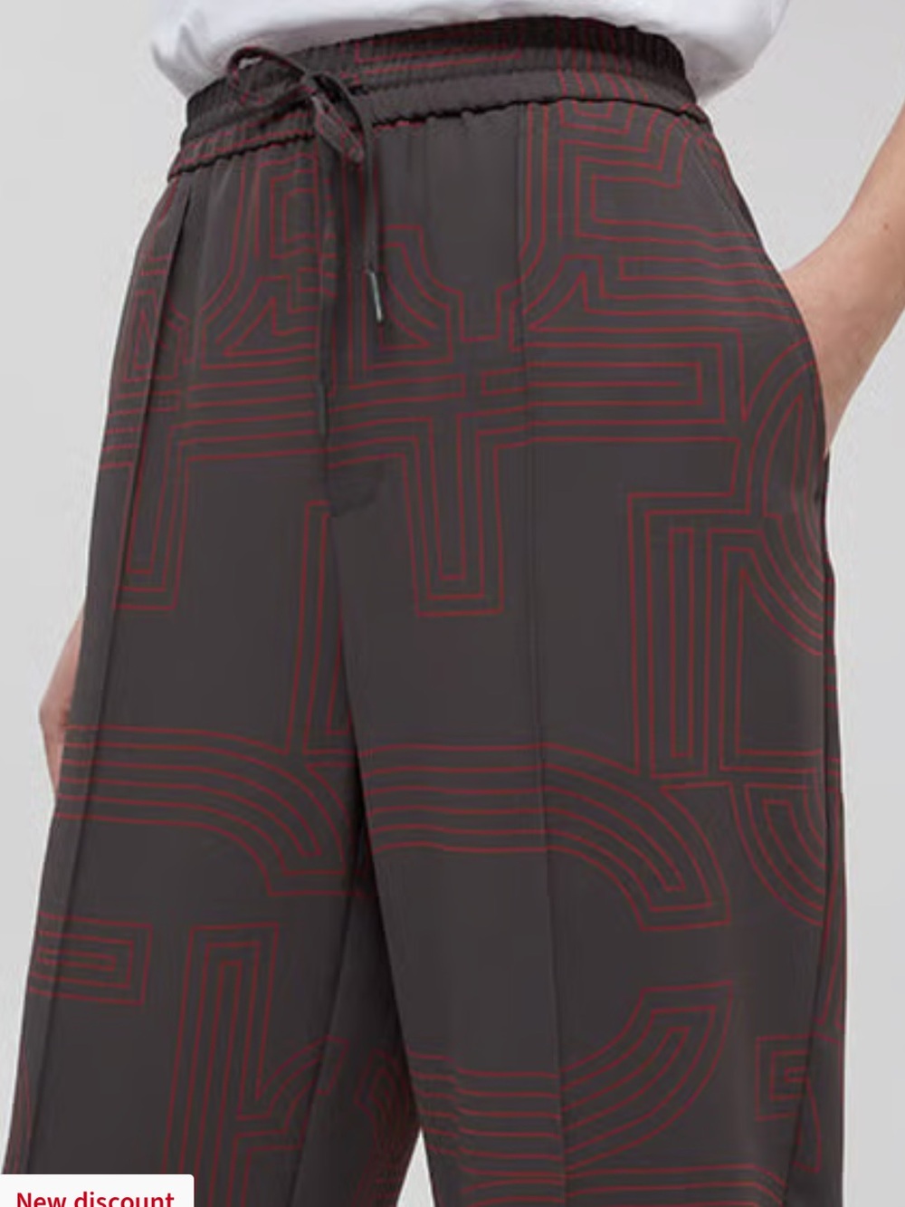 Closed Dark Nickel pants with Rust Geometric Print.$398